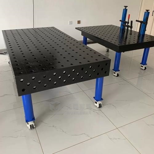 16 series heavy duty modular welding table with 5/8 hole pattern