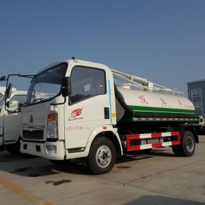 China HOWO 4X2 Fecal Suction Truck 4000 Liters Euro II Suction Sewage Truck on sale