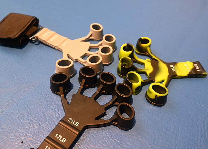 Enhance your finger strength with this Adjustable Finger Exerciser featuring 6 resistance levels.