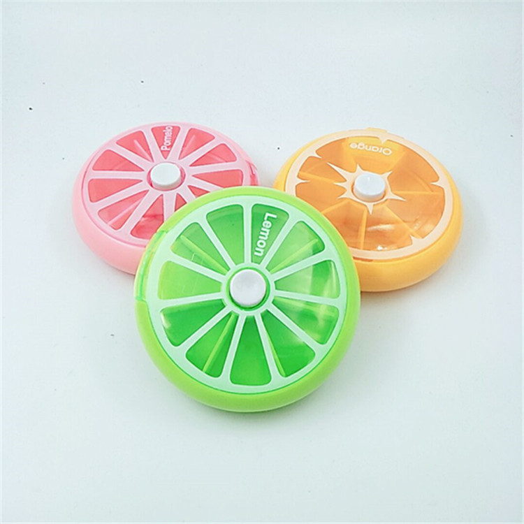 China 7 days rotation pill box round pocket size on sale