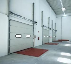 China 650N/M2 Wind Pressure Industrial Sectional Doors Sectional Overhead Garage Door European Standard Quality Modern Door on sale