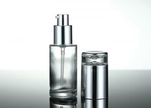 Quality 1 Oz Transparent Facial Serum Oil Empty Glass Lotion Bottle With Silver Pump Caps wholesale