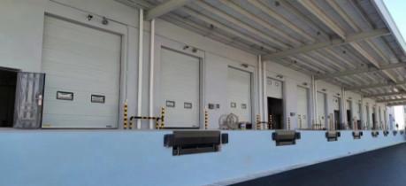 Galvanized Steel Industrial Sectional Doors Wind Resistant Internal Polyurethane