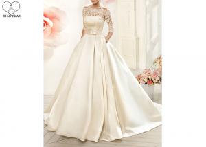 China Cream Laces Satin Ball Gown Wedding Dress With Sleeves Back Zipper And Buttons on sale