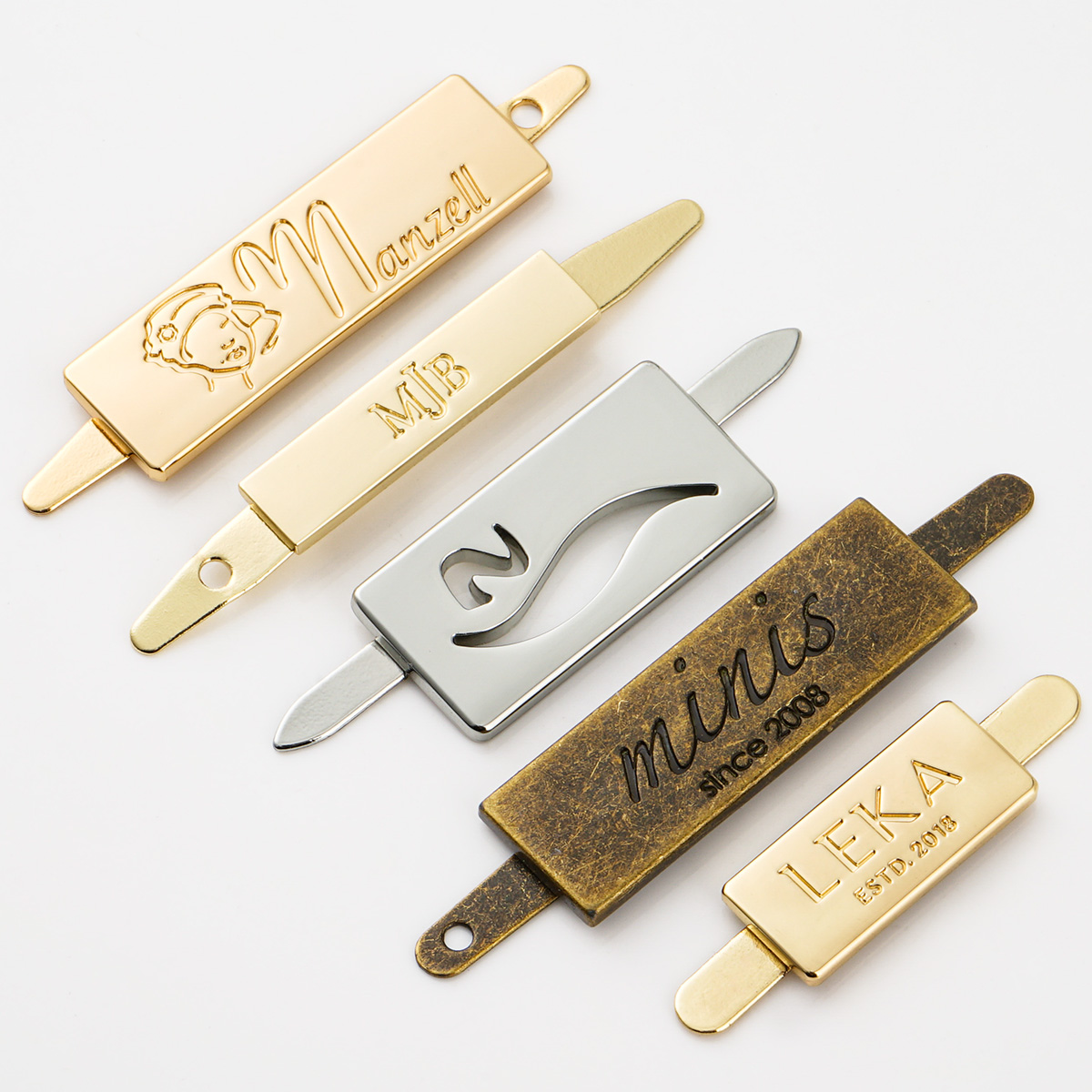 Regional Feature Customized Laser Logo Metal Tag Label For Bags Die Casting Technique