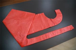 China Single Use Red Disposable PE Apron , Polythene Disposable Paint Aprons For Adult on sale