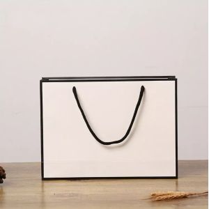 Quality Recyclable Kraft Paper Handbag Cardboard Rope Handle Gift Bag ISO wholesale
