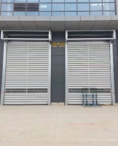 China Wind Resistance Industrial Spiral Hard Fast Door High Frequency Opening And Closing on sale