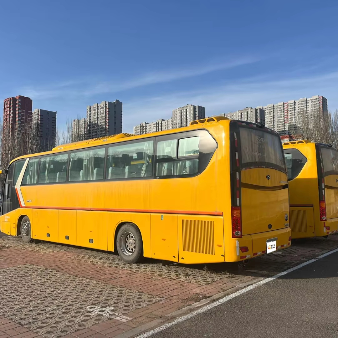 Bulk sale of Yuchai 330 engine double-glazed 63-seat yellow Golden Dragon second-hand buses