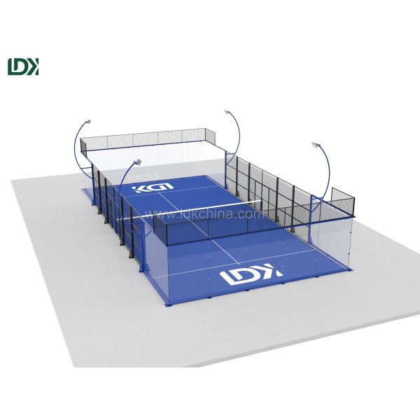 Padel court during competitive gameplay with players in action