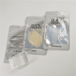 China Glossy clear front dental floss hang hole plastic bags aluminum foil customized zip lock bag packaging on sale