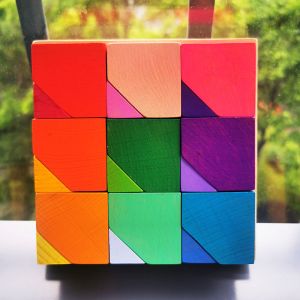 Quality 2300g 4cm Rainbow Wooden Flower Puzzle Wooden Stone Stacking Game wholesale