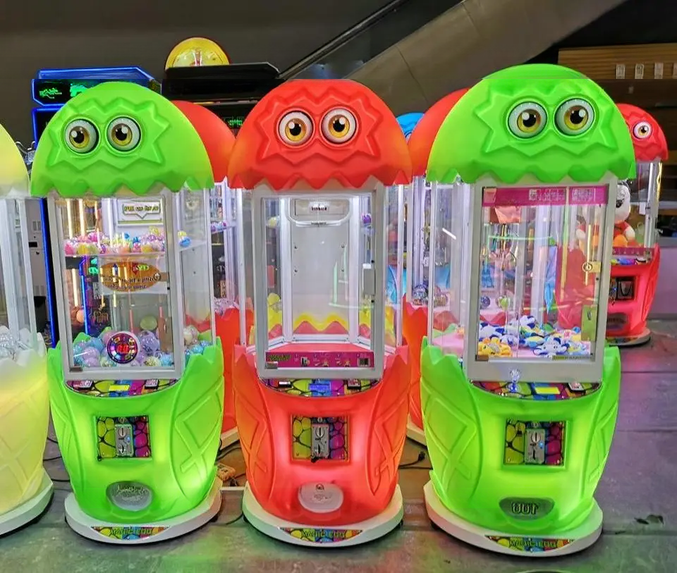Dreamland New Coin-Operated Plush Toy Doll Grabber Machine Magic Egg Claw Crane Game Machine for Sale