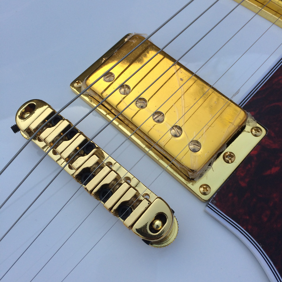 High quality hollow body jazz electric guitar,The White Guitar, the real abalone mother inlaid with the finger plate