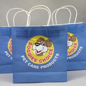China Custom Printing Pet Pattern Recyclable Paper Gift Bags For Dog Retail Shop on sale