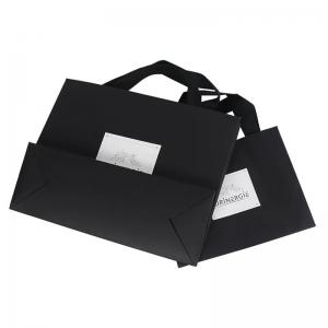 China OEM Black White Apparel Paper Bag Clothing Marble Paper Gift Bags on sale