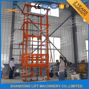 China 1T 12m CE Approved Vertical Guide Rail Elevators Hydraulic Warehouse Cargo Lift on sale