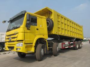 China SINOTRUK Howo 8×4 isuzu dump truck  70 Tons Load 30CBM dump box  Model ZZ3317N4667A on sale