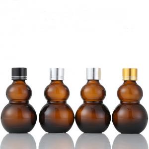 China Brown Glass Bottles Containers High Sealing Performance Amber Gourd Shape on sale