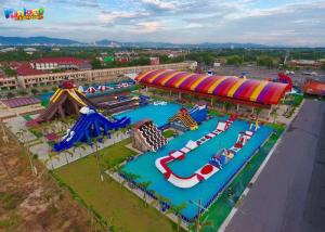 China Large Floating Water Parks Rentals 150m Inflatable Water Slides on sale