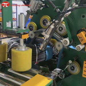 Automatic horizontal hose pipe coil wrapping machine