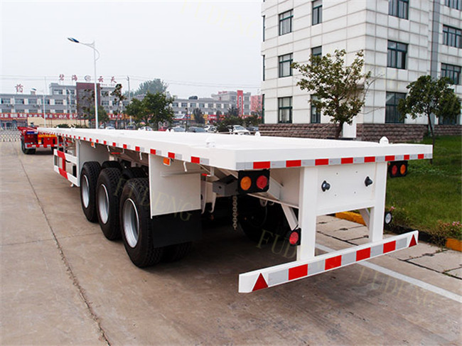 Heavy duty suspension 40ft flatbed container trailers carry 40Tons Containers